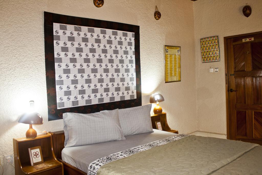 Four Villages Inn Кумаси Номер фото