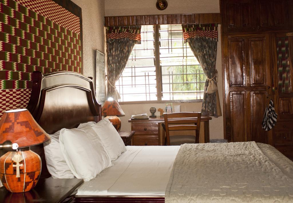 Four Villages Inn Кумаси Номер фото