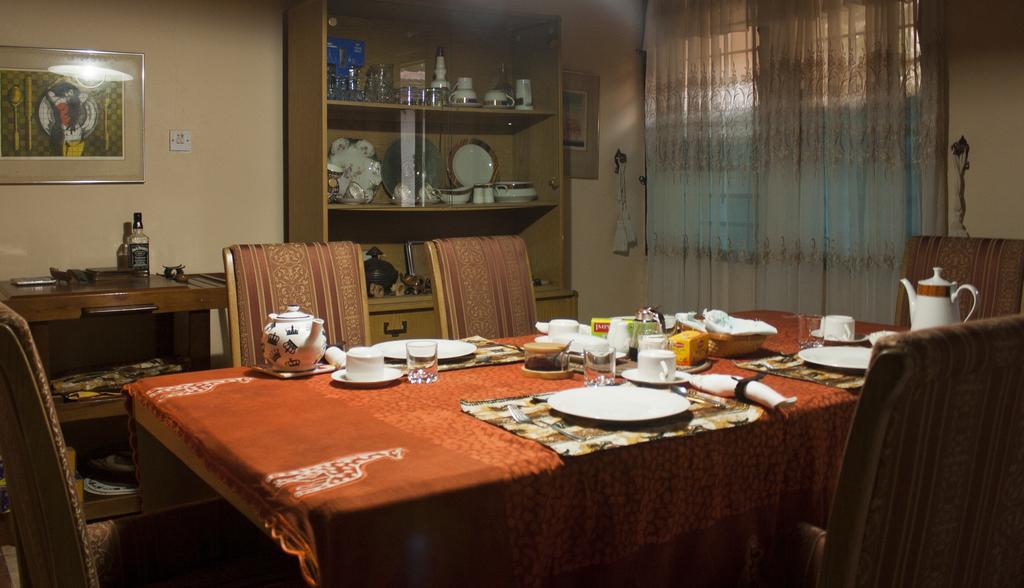 Four Villages Inn Кумаси Экстерьер фото