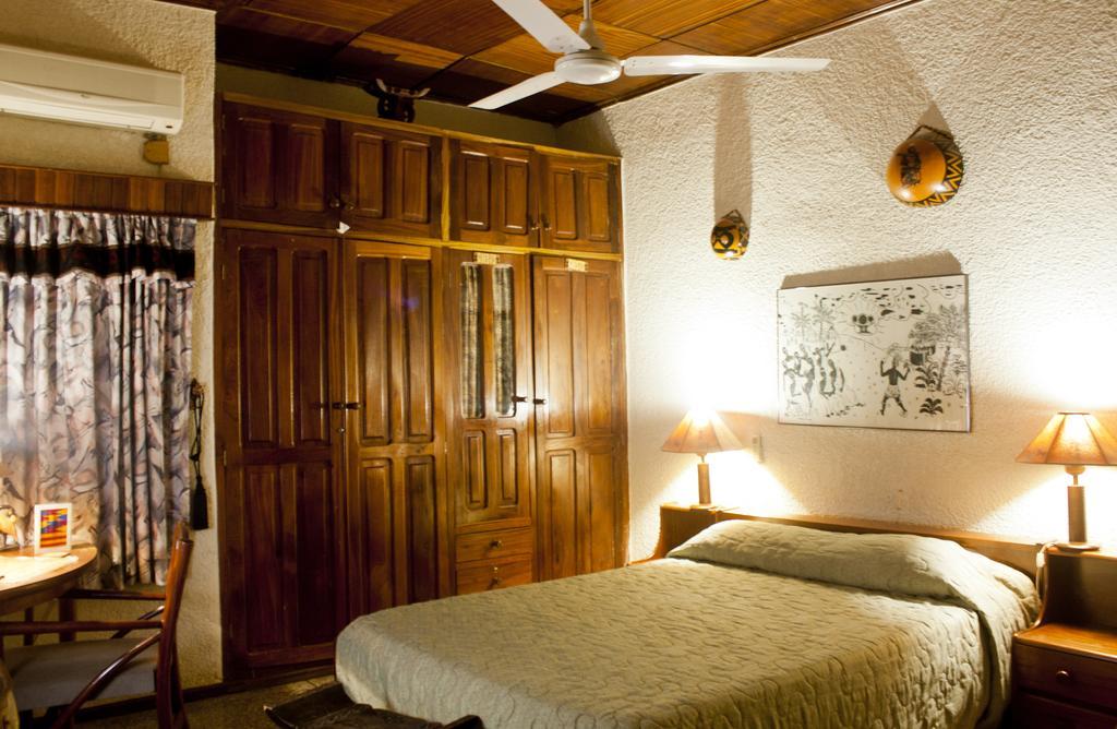 Four Villages Inn Кумаси Номер фото